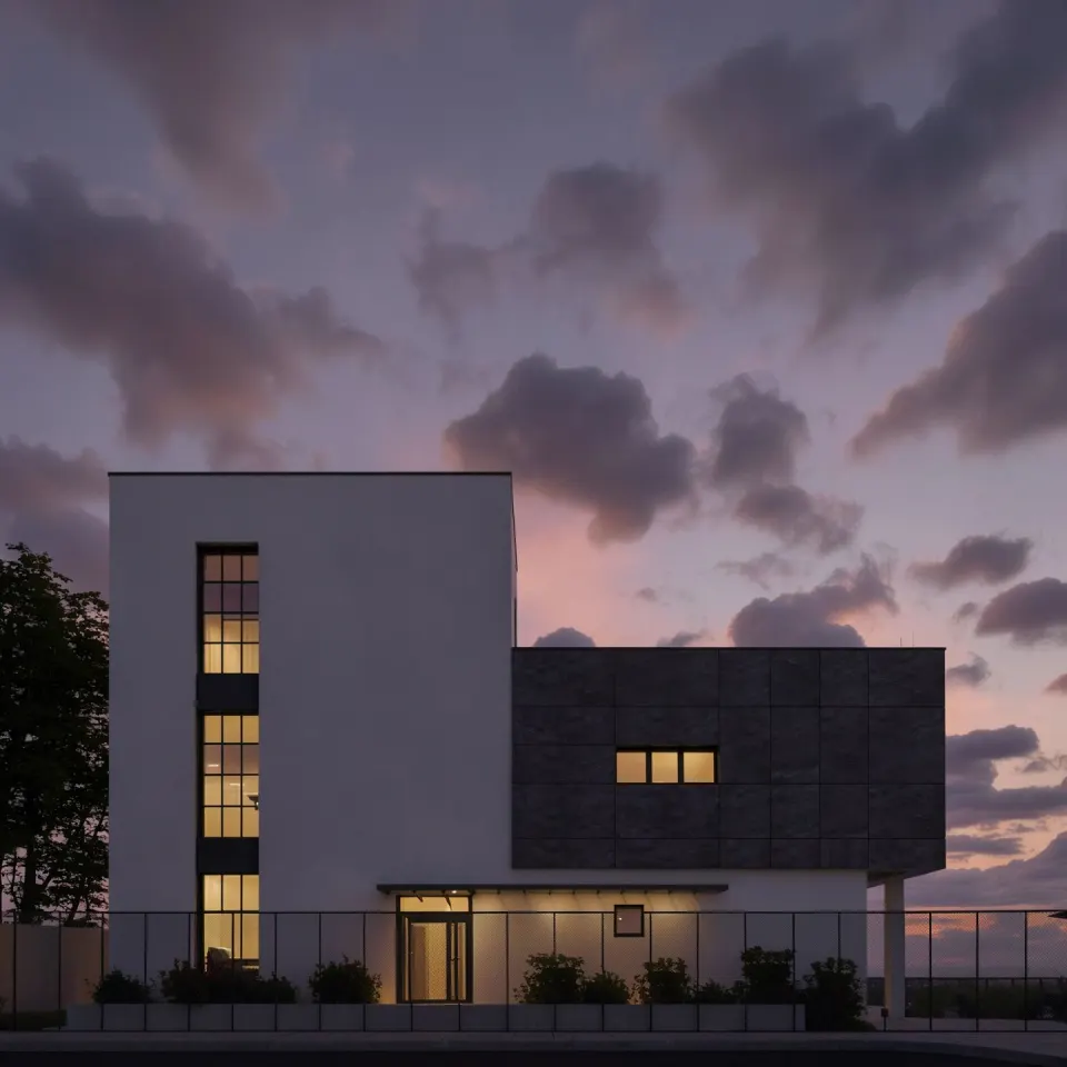 Casa S — volumul alb cu fereastra verticală a scării și corpul placat cu piatră închisă, la amurg